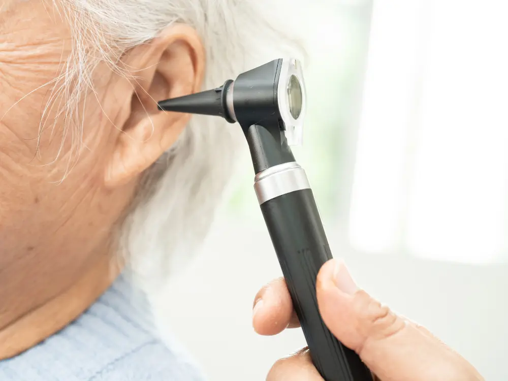 Ilustracja przedstawiająca diagnostykę słuchu i badania audiologiczne